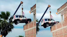 man-parks-mahindra-scorpio-car-in-rooftop-fearing-theft