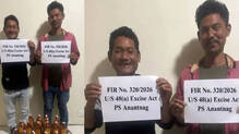 anantnag-police-arrest-two-in-liquor-seizure-case-smiling-mugshots-go-viral