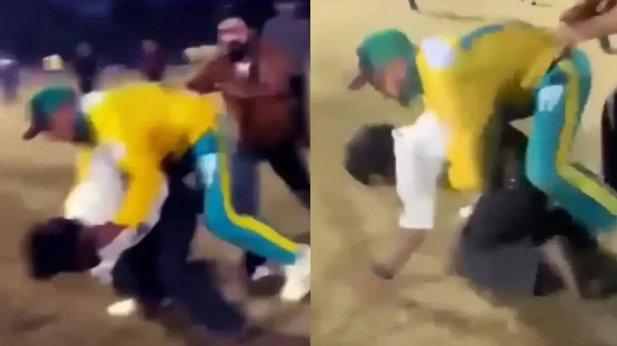 കാണിയെ മൈതാനത്തിട്ട് മർദിച്ച്  ക്രിക്കറ്റ് താരം; വീഡിയോ വൈറൽ, നടപടി ആവശ്യപ്പെട്ട് കായികപ്രേമികൾ